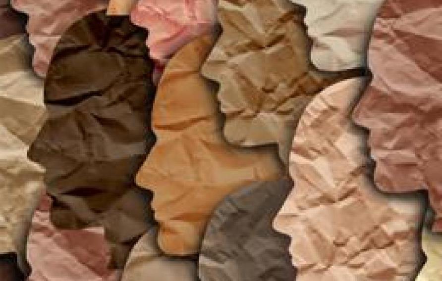 剪纸人物的侧面在不同的皮肤颜色的数组