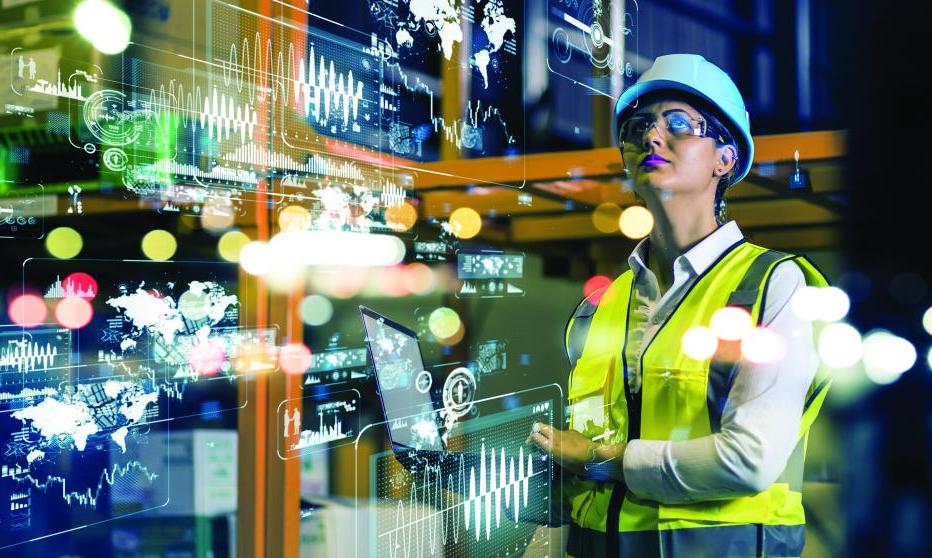 Woman in PPE surrounded by superimposed data
